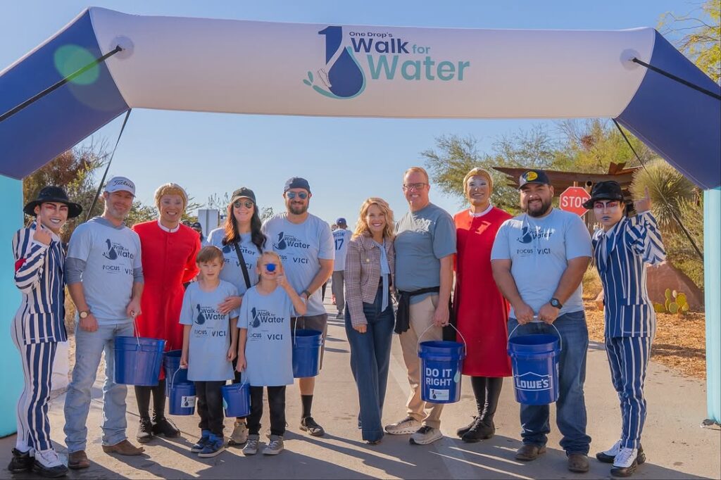 A group of people with Crystal and Chad Hirschi at One Drop's Walk for Water in Las Vegas